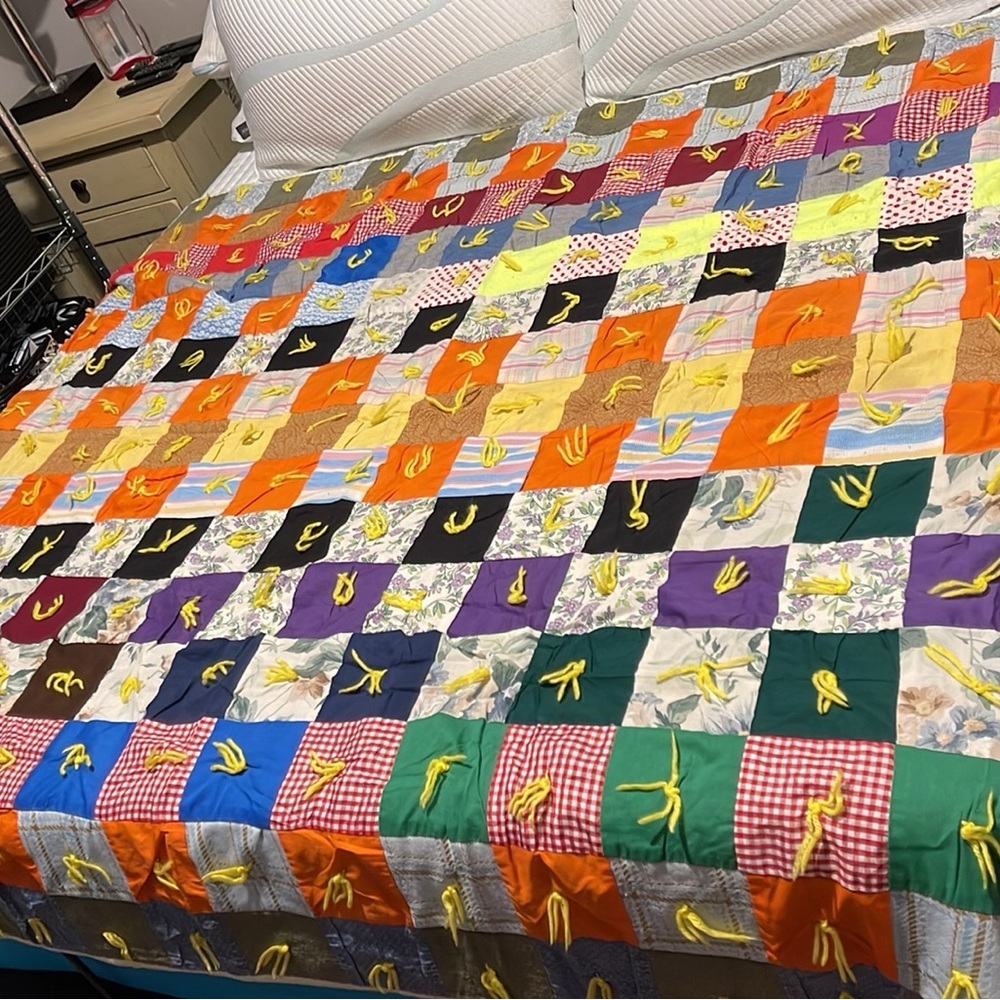 Vintage handmade patchwork with yarn ties quilt!
